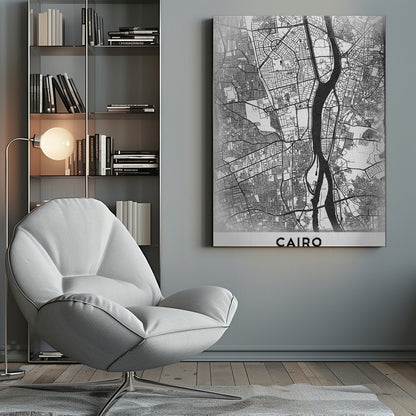 A minimalist black and white framed poster of a street map of Cairo. The Nile River flows vertically through the center of the detailed city grid. The word 'CAIRO' is printed in a bold, black, sans-serif font at the bottom. Decor