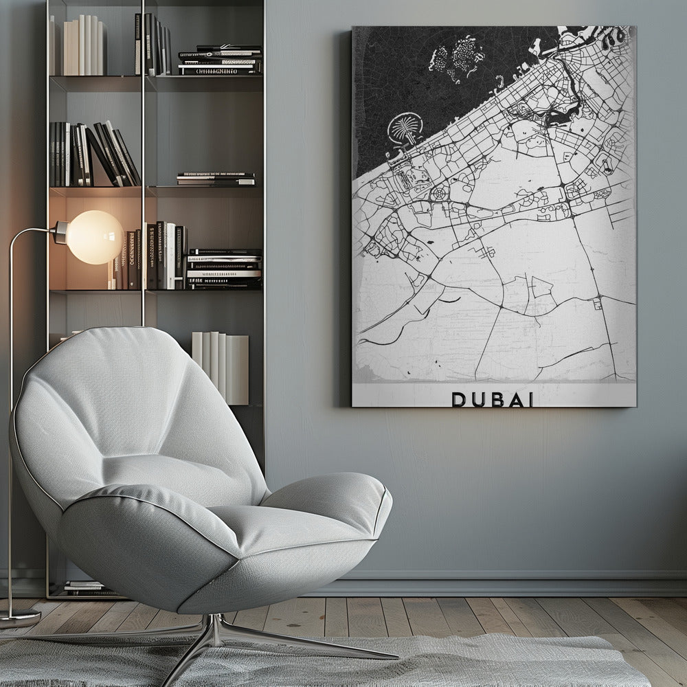 A minimalist black and white map of Dubai in a black frame. The water is depicted in black with a subtle texture, while the land is white, showing the city's road network in thin black lines. Key features like the Palm Jumeirah and The World Islands are visible off the coast. The word 'DUBAI' is written in a bold, black, sans-serif font at the bottom. Decor