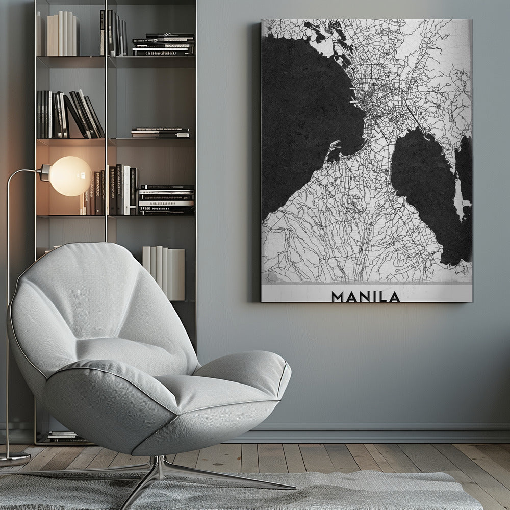A minimalist black and white map of Manila, Philippines, presented in a black frame. The map showcases the city's intricate road network in black lines on a white landmass, contrasted against textured black bodies of water. The word 'MANILA' is printed in a bold, black sans-serif font at the bottom of the poster. Decor