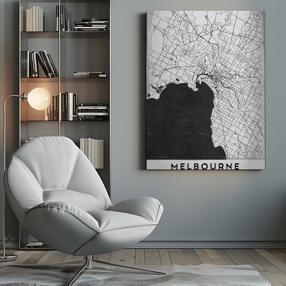 A minimalist black and white map of Melbourne, Australia, presented in a black frame. The city's road network is depicted with fine black lines on a textured white background, while the adjacent bay is shown in solid, textured black. The name 'MELBOURNE' is written in a bold, black font at the bottom. Poster