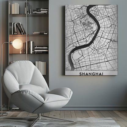 A minimalist black and white street map of Shanghai in a black frame. The map highlights the city's road network and the prominent Huangpu River, with the name 'SHANGHAI' printed at the bottom. Decor
