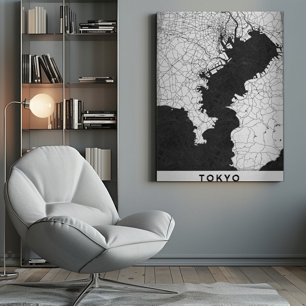 A minimalist black and white map of Tokyo, Japan, in a black frame. The map shows the city's road network in thin black lines on a white background, while Tokyo Bay and other water bodies are depicted in solid black. A white banner at the bottom contains the word 'TOKYO' in a clean, sans-serif font. Wall Art