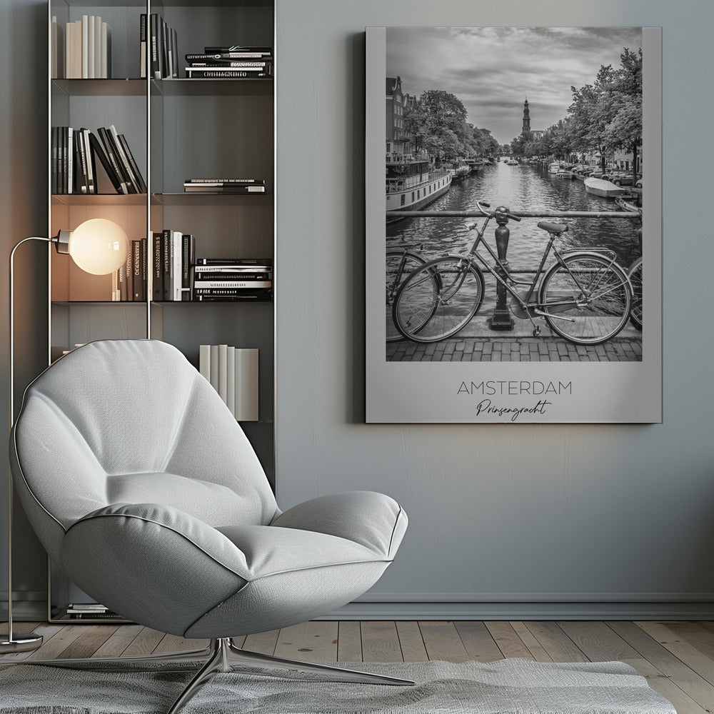 A black and white poster of the Prinsengracht canal in Amsterdam. A bicycle is parked on a bridge in the foreground, overlooking the canal lined with houseboats, trees, and traditional Dutch buildings. The Westerkerk church tower is visible in the distance. The poster has a white border with the words 'AMSTERDAM', 'Prinsengracht', and 'NEDERLAND' at the bottom. Poster