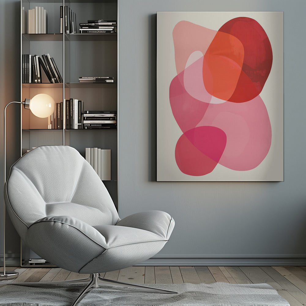 An abstract art print in a black frame, featuring a composition of overlapping, translucent, organic shapes in shades of red, orange, and pink on an off-white background. Print