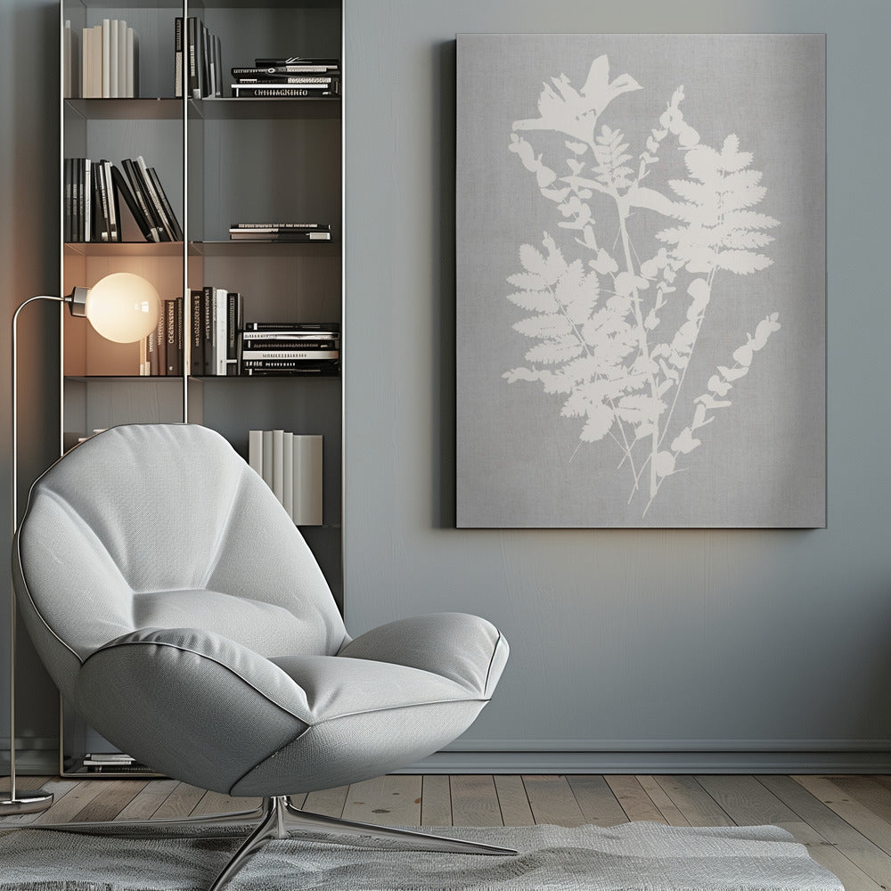A framed artwork featuring a white silhouette of a botanical arrangement with ferns, flowers, and leaves against a textured light grey background. Decor