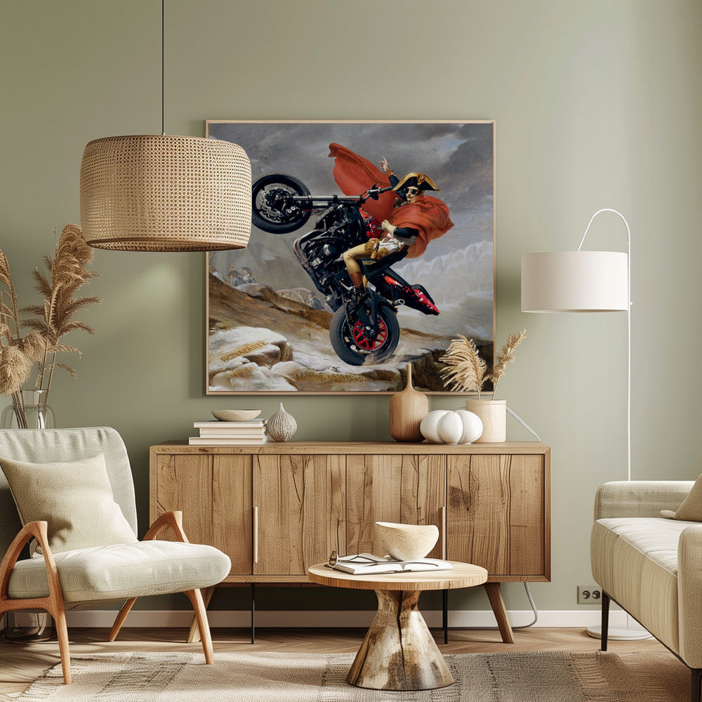 A framed parody artwork of the classic painting 'Napoleon Crossing the Alps.' Instead of a horse, Napoleon Bonaparte is performing a dramatic wheelie on a modern black and red motorcycle. He wears sunglasses, his signature bicorne hat, and a flowing red cape against a snowy, mountainous backdrop. Print
