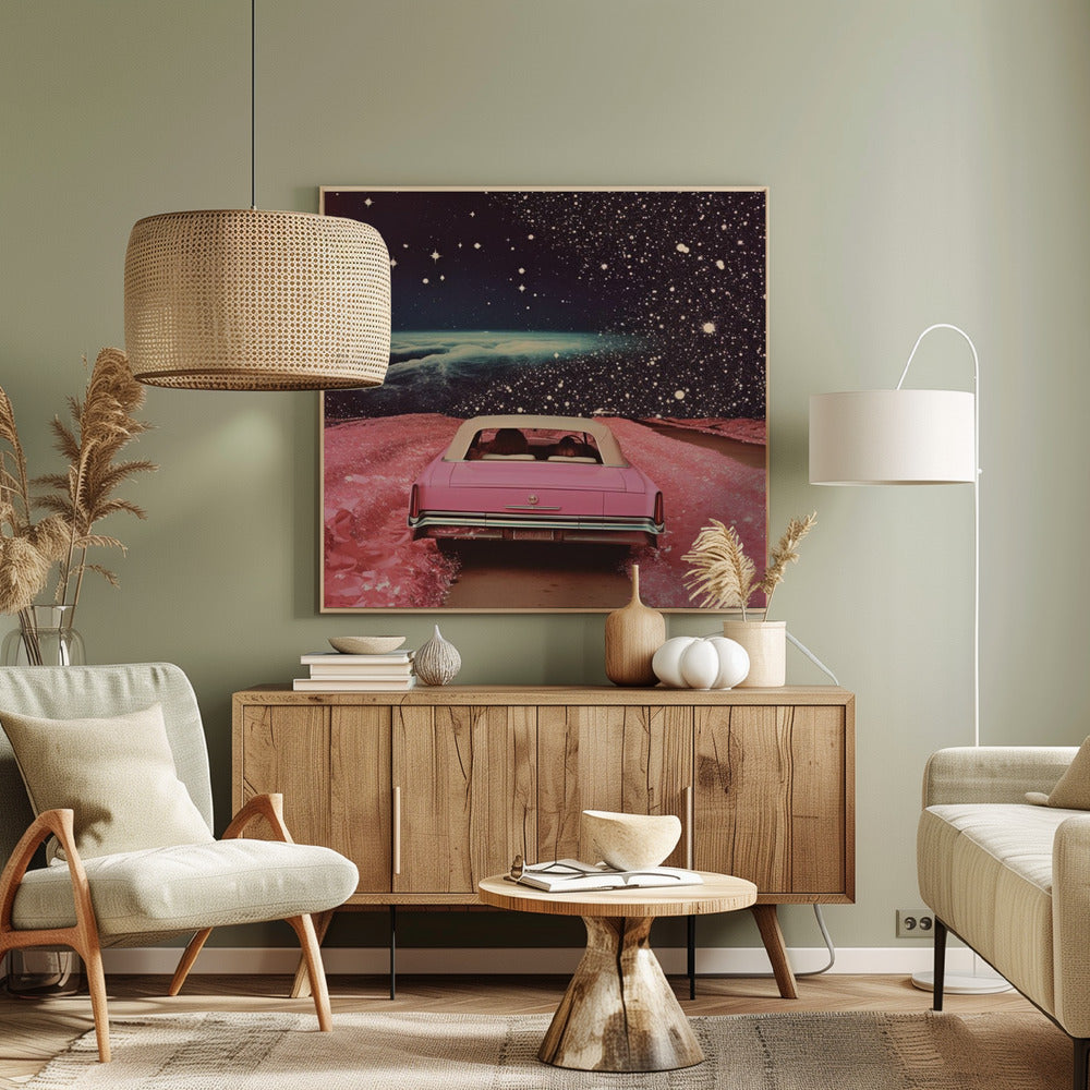 A framed collage-style artwork depicting a vintage pink convertible from behind, driving on a surreal pink road. The background is a vast, dark, star-filled space with a luminous, cloudy planet horizon. Poster
