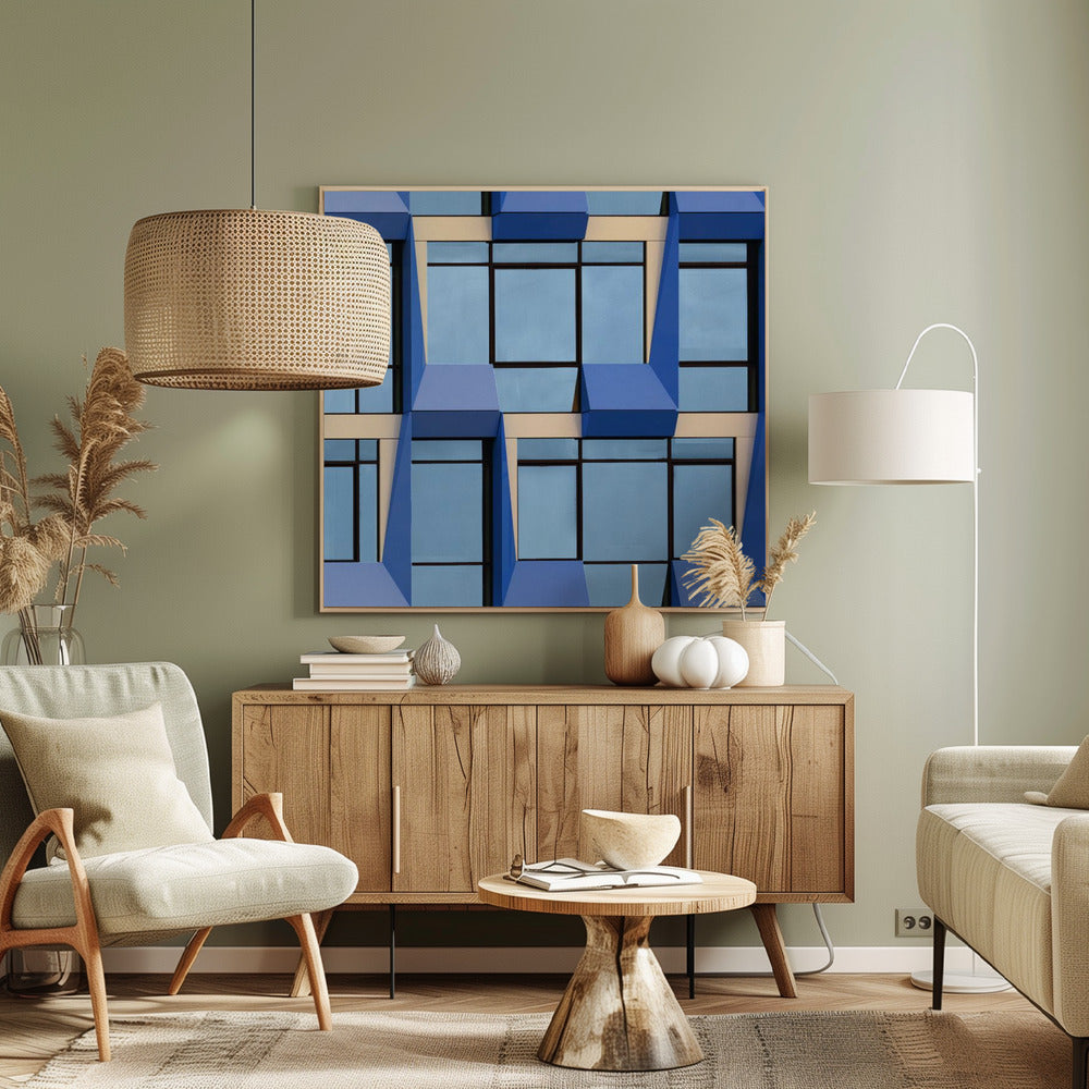 A framed abstract architectural photograph showing a repeating pattern of a modern building's facade. The image features geometric, three-dimensional blue elements surrounding light blue windows with black frames, all set against horizontal cream-colored bands. The entire piece is presented within a light wood frame. Print