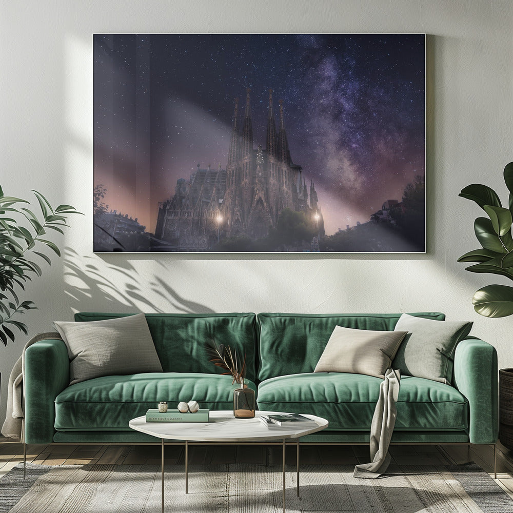 A fantastical night view of the Sagrada Familia in Barcelona, its intricate spires reaching up towards a magnificent, starry sky filled with the purple and pink hues of the Milky Way galaxy, all enclosed in a silver frame. Artwork