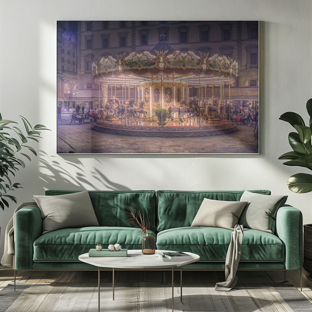 A beautifully illuminated vintage carousel with ornate horses in a European cobblestone plaza at night. The carousel is the central focus, glowing with warm lights against a backdrop of historic buildings and a starry purple sky. Poster
