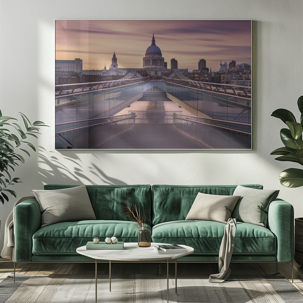 A photograph looking down the center of the Millennium Bridge in London, leading the eye directly to St. Paul's Cathedral, which is centered in the background under a beautiful purple and orange sunset sky. Print