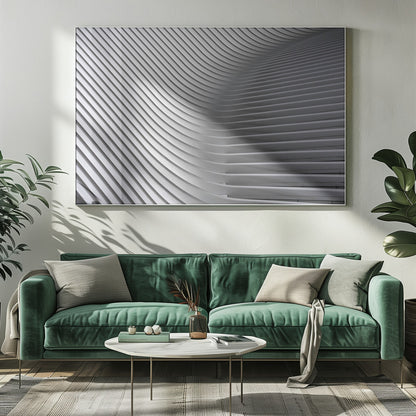 A framed, close-up, abstract photograph of a modern architectural structure. Parallel white ribs curve and undulate across the frame, creating a sense of movement and rhythm through the interplay of light and shadow. Artwork