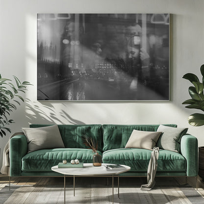 A moody black and white double exposure photograph showing a rainy London street at night with Big Ben, overlaid with the faint reflections of people inside a moving vehicle like a bus. The image has a dreamy, layered effect and is displayed in a silver frame. Print