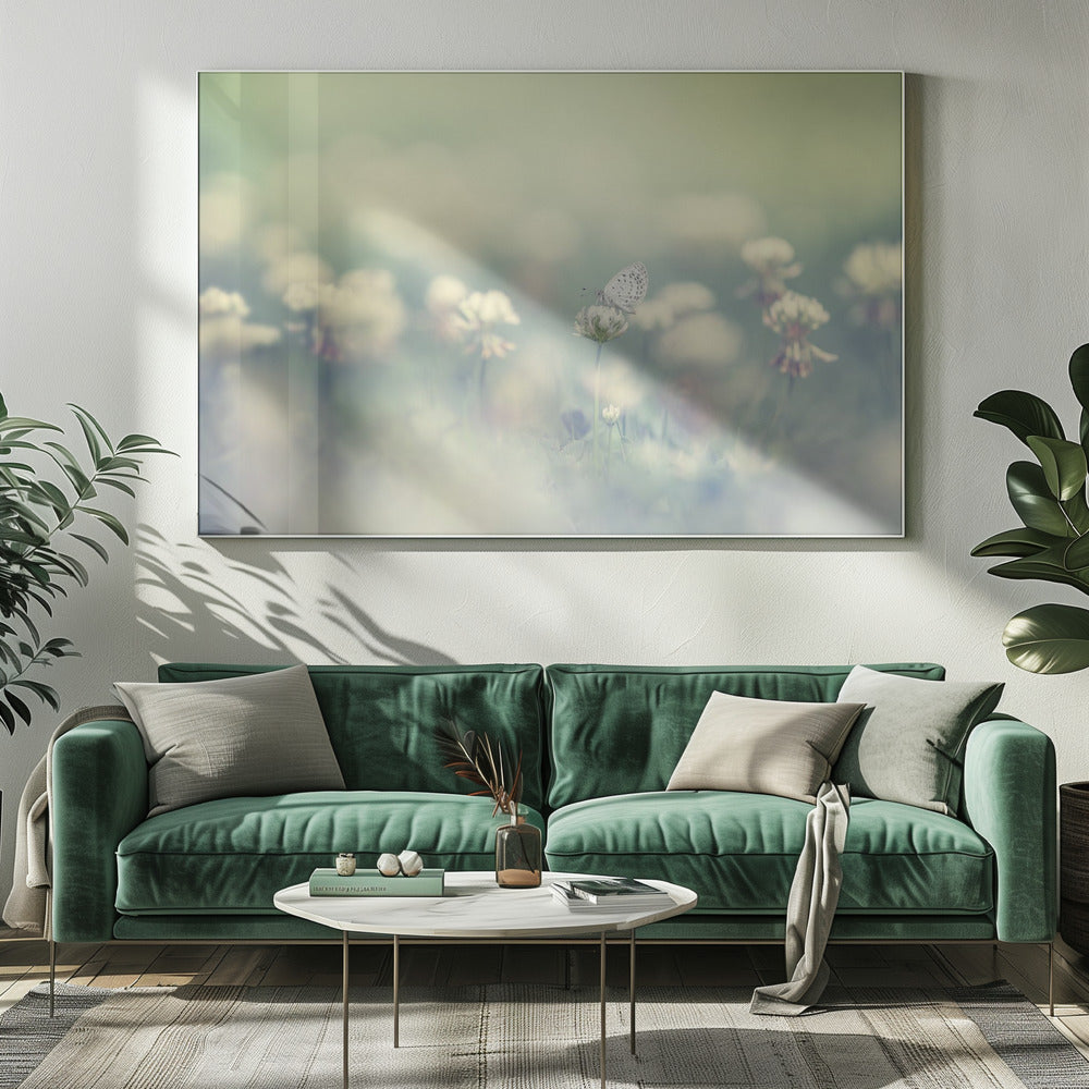 A delicate white butterfly with black spots rests on a white clover flower in a dreamy, soft-focus photograph. The background is a blur of a green and cream-colored meadow, creating a peaceful and ethereal atmosphere. Print