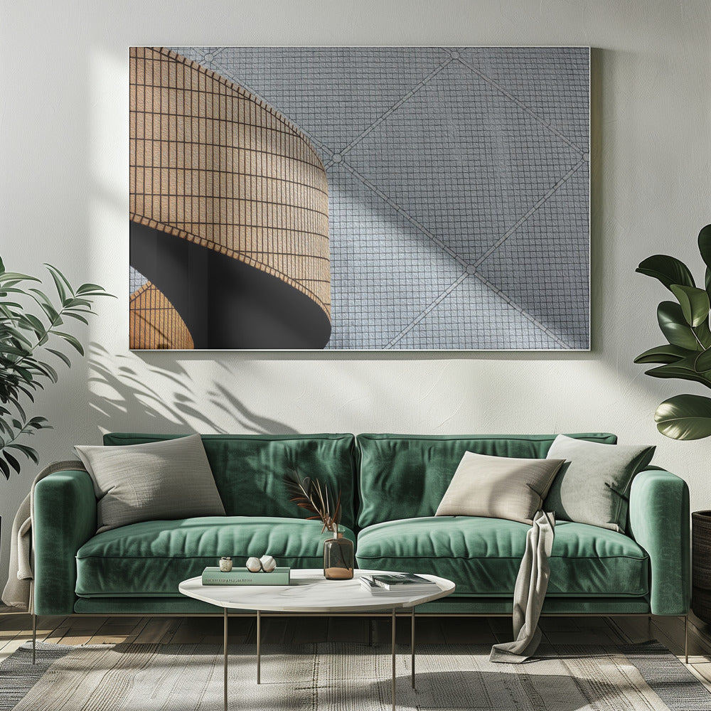 An abstract architectural image with a painterly texture, framed in gray. The composition features a curved wall of vertical brown tiles on the left, casting a sharp black shadow, juxtaposed with a flat surface of gray square tiles arranged in a grid with diagonal lines on the right. Artwork