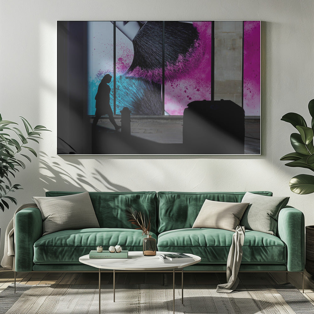 A framed photograph of a street scene where a person's silhouette is captured walking past a large, vibrant window advertisement. The ad features a close-up of a makeup brush with explosions of magenta and cyan powder. The foreground is cast in deep shadow, creating a dramatic contrast. Print