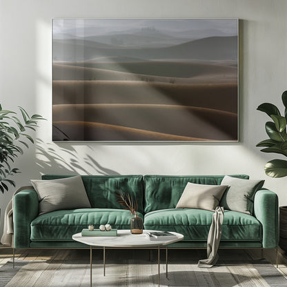 A framed photograph of a serene desert landscape, with layers of rolling sand dunes creating a sense of depth. Dark brown dunes in the foreground give way to lighter, hazy dunes and hills in the misty background. Print