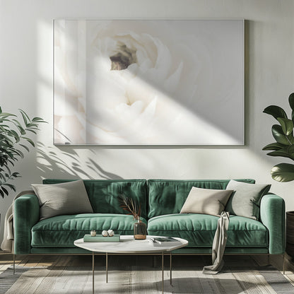 A soft-focus, macro photograph of a white ranunculus flower, its delicate, layered petals filling the frame. The image has a bright, ethereal quality and is presented in a brushed silver frame. Wall Art