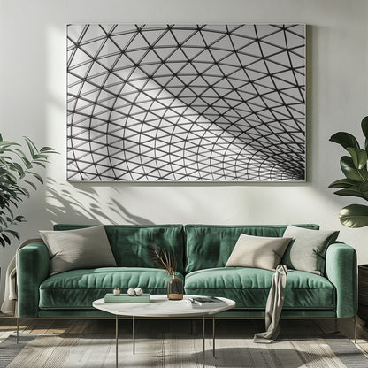 A framed, black and white photograph of a modern architectural dome ceiling. The image is a close-up, looking up at the intricate metal framework that creates a repeating pattern of triangles against the bright glass panels. Poster