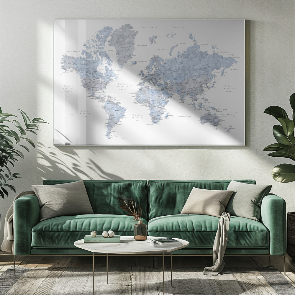 A framed world map presented in a modern, watercolor style. The continents are rendered in shades of dusty blue and cool gray against a crisp white background. All text, including countries and oceans, is in Spanish. The entire piece is enclosed in a simple, light gray frame. Poster