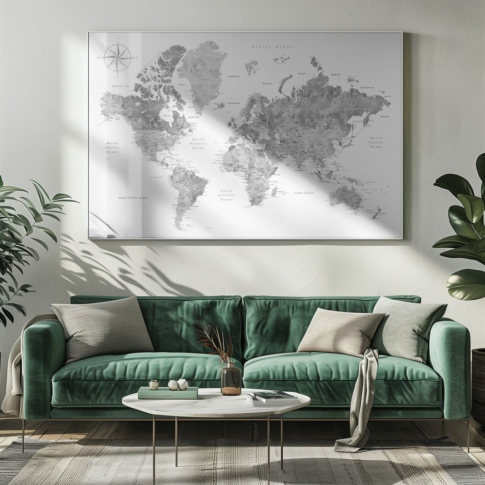 A framed, modern world map presented in a monochrome palette of black, white, and various shades of gray. The landmasses feature a detailed, textured design, set against a clean white background for the oceans. A compass rose is visible in the top left corner. The map is enclosed within a simple, light gray frame. Poster