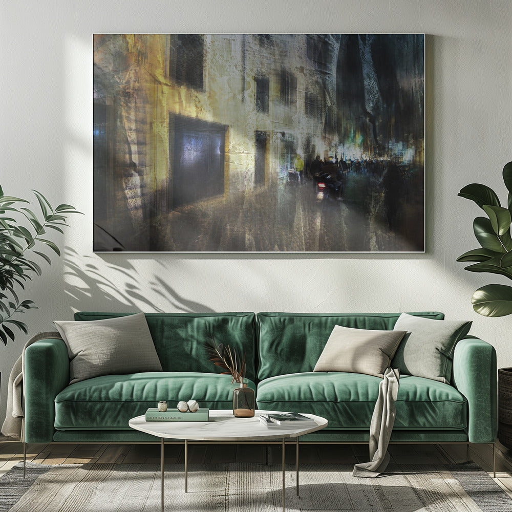 A framed abstract digital artwork depicting a busy, narrow city street at night. The image has a heavily textured, painterly style, with blurred motion effects. A weathered, yellow-lit building is on the left, while the street on the right is filled with indistinct figures of people and a motorcycle, with city lights glowing in the distance. Wall Art