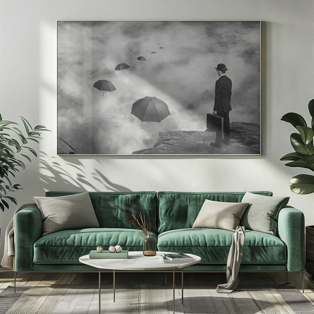 A surreal black and white photograph of a man in a suit and bowler hat holding a briefcase, standing on a cliff edge. He gazes into a foggy expanse where a path of floating black umbrellas leads into the misty distance. Decor