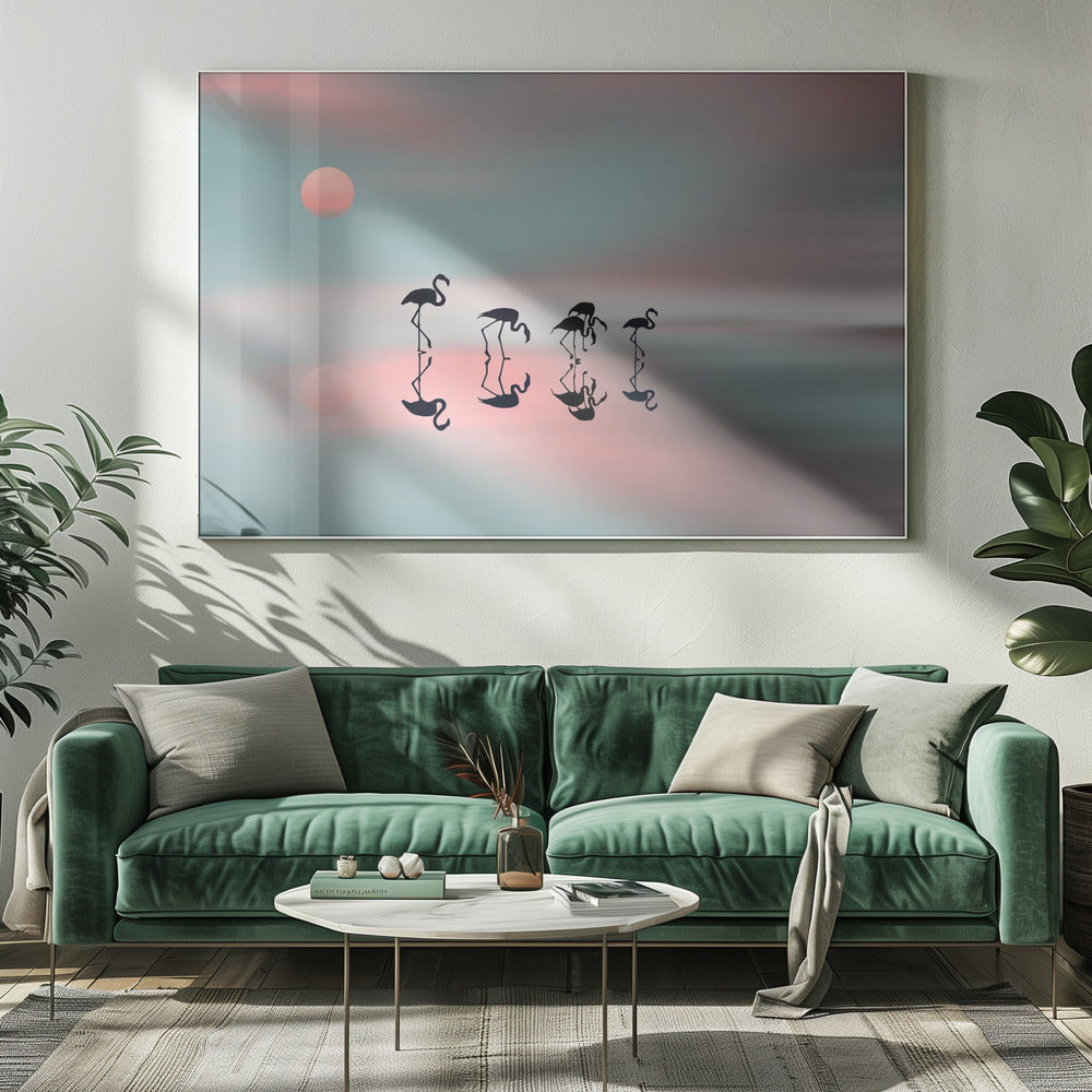 A serene artwork of five black flamingo silhouettes wading in calm water, their reflections mirrored below them. The background is a soft, blurred gradient of pastel pink and teal, with a pale pink sun low in the sky, creating a tranquil sunset scene. Poster
