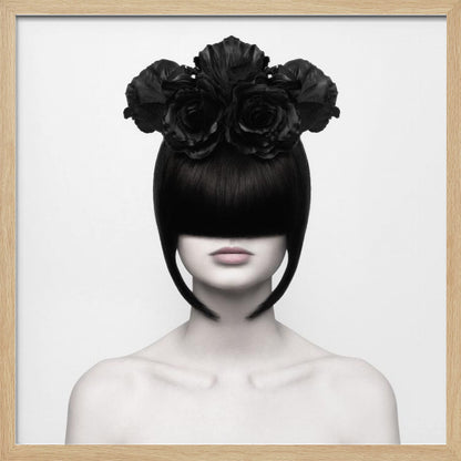 A stylized black and white portrait of a woman with a sleek black bob hairstyle where the bangs completely cover her eyes. She wears a large, elaborate headpiece made of black roses. Her expression is neutral, showing only her mouth and chin. The image is set against a plain white background and enclosed in a light wood frame. Print