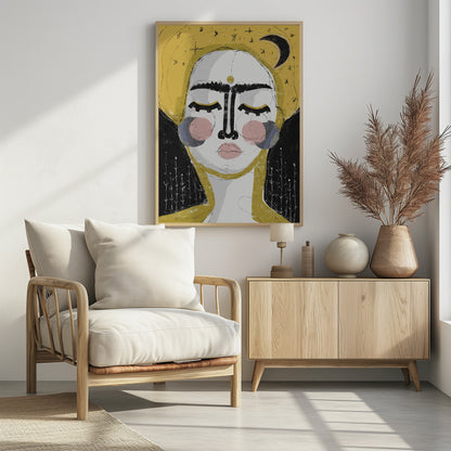 An abstract, framed painting of a serene face with closed eyes. The face is rendered in white with pink blush on the cheeks and bold, black lines for the unibrow and nose. A golden dot adorns the forehead. The background is a vibrant mustard yellow featuring a black crescent moon and simple star sketches. Wall Art
