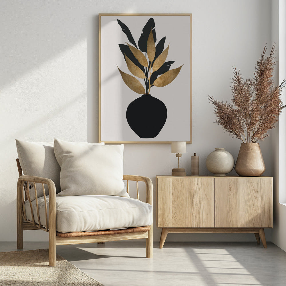 A minimalist framed artwork featuring a black vase holding a plant with both black silhouette leaves and textured gold leaves, set against a simple off-white background. Wall Art