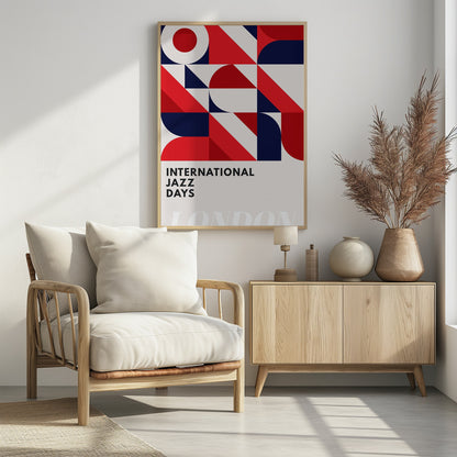 A framed poster advertising 'International Jazz Days London'. The top two-thirds feature a bold, abstract geometric pattern in a grid format, using red, dark blue, and off-white shapes like circles, semi-circles, and diagonal blocks. The bottom third displays the text 'INTERNATIONAL JAZZ DAYS' in a black sans-serif font against the off-white background. Wall Art