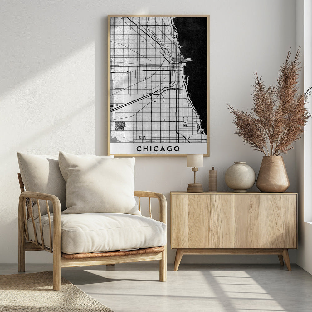A minimalist black and white map of Chicago, featuring a grid street layout, major thoroughfares, and the shoreline of Lake Michigan. The map has a subtle crackled texture, is enclosed in a black frame, and has the word 'CHICAGO' in capital letters at the bottom. Decor