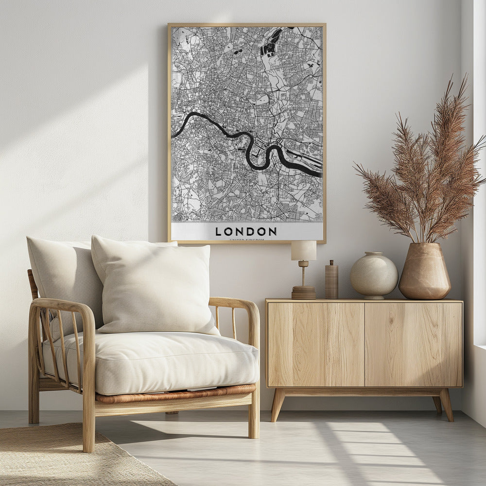 A minimalist black and white map of London, featuring the River Thames snaking through a detailed network of streets. The map is enclosed in a simple black frame, with the word 'LONDON' printed in a bold, modern font at the bottom. Artwork