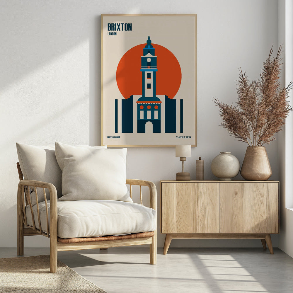A minimalist travel poster of Brixton, London, featuring a stylized blue and white clock tower set against a large orange circle on a cream background. The text 'BRIXTON LONDON' is at the top, and 'UNITED KINGDOM' with geographic coordinates are at the bottom. The entire print is enclosed in a simple black frame. Poster