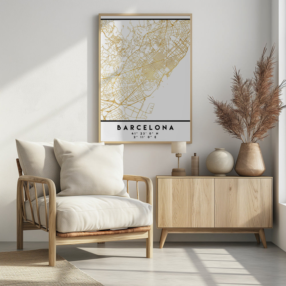 A modern, minimalist framed poster featuring a gold line map of Barcelona, Spain, on a clean white background. Below the map, the city's name 'BARCELONA' is printed in bold black text, with its geographic coordinates listed underneath. Decor
