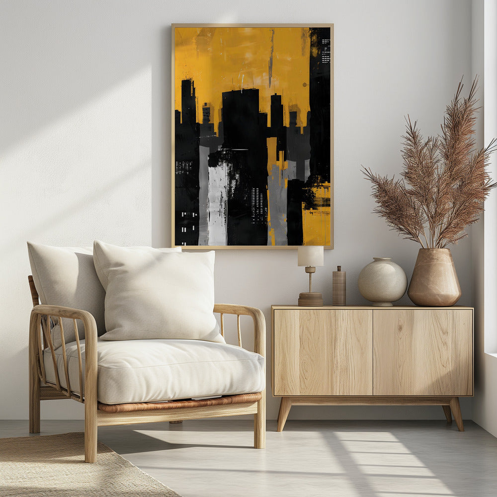 An abstract painting of a city skyline with stark black, grey, and white building silhouettes set against a vibrant, textured mustard yellow sky, framed in black. Artwork