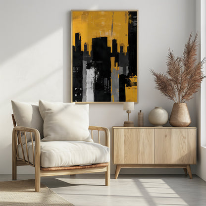An abstract painting of a city skyline with stark black, grey, and white building silhouettes set against a vibrant, textured mustard yellow sky, framed in black. Artwork