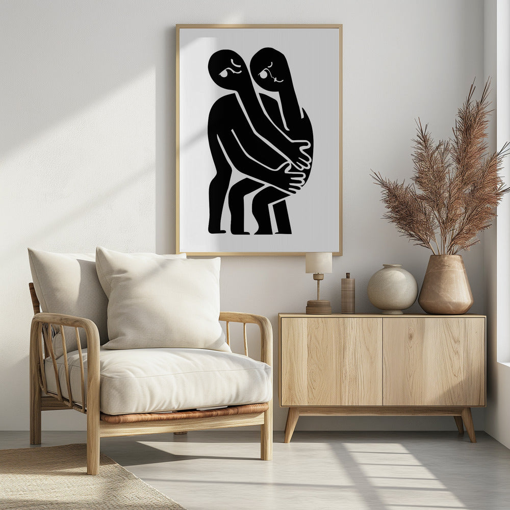A minimalist black and white art print featuring two abstract, stylized figures in a close embrace. The figures are rendered in solid black against a plain white background, with their elongated limbs and bodies intertwined. Simple white lines within the black silhouettes create expressive facial features. The artwork is contained within a thin black frame. Wall Art