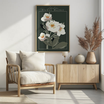 A vintage-style art print of the 'London Flower Market', featuring stylized white hellebore flowers with pink and gold centers on green stems, set against a dark, moody green background. The image is framed with a thin white line and a larger black border. Artwork