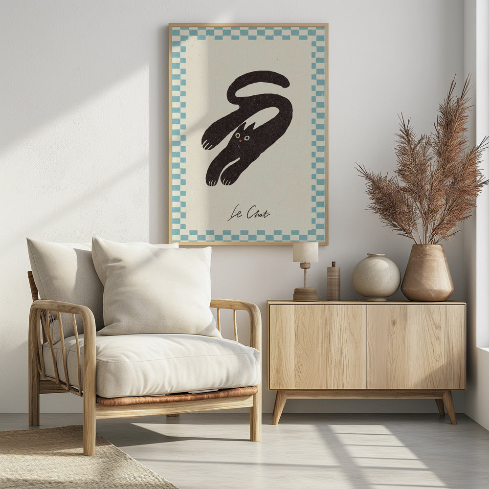 A vintage-style art print of a stylized black cat with an elongated, curving body. The cat has wide eyes and is set against a cream background with a blue and cream checkered border. Below the cat, the words 'Le Chat' are written in cursive script. The artwork is presented in a simple black frame. Print