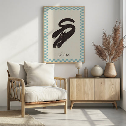A vintage-style art print of a stylized black cat with an elongated, curving body. The cat has wide eyes and is set against a cream background with a blue and cream checkered border. Below the cat, the words 'Le Chat' are written in cursive script. The artwork is presented in a simple black frame. Print