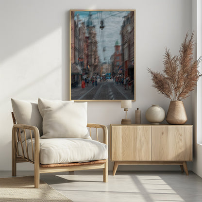 A motion-blurred, dreamlike photograph of a busy street in Amsterdam. Historic buildings line the cobblestone road, which is filled with pedestrians and features tram tracks. A prominent clock tower rises against a cloudy blue sky, and the entire scene has a shaky, layered effect. Poster