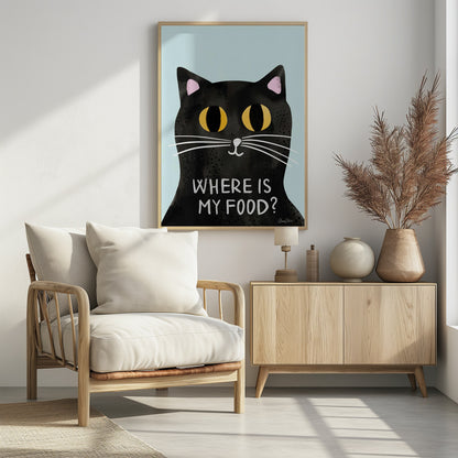 A humorous art print of a black cat with large, expressive yellow eyes looking forward against a light blue background. Below the cat's face, the phrase 'WHERE IS MY FOOD?' is written in a white, uppercase, handwritten-style font. Wall Art