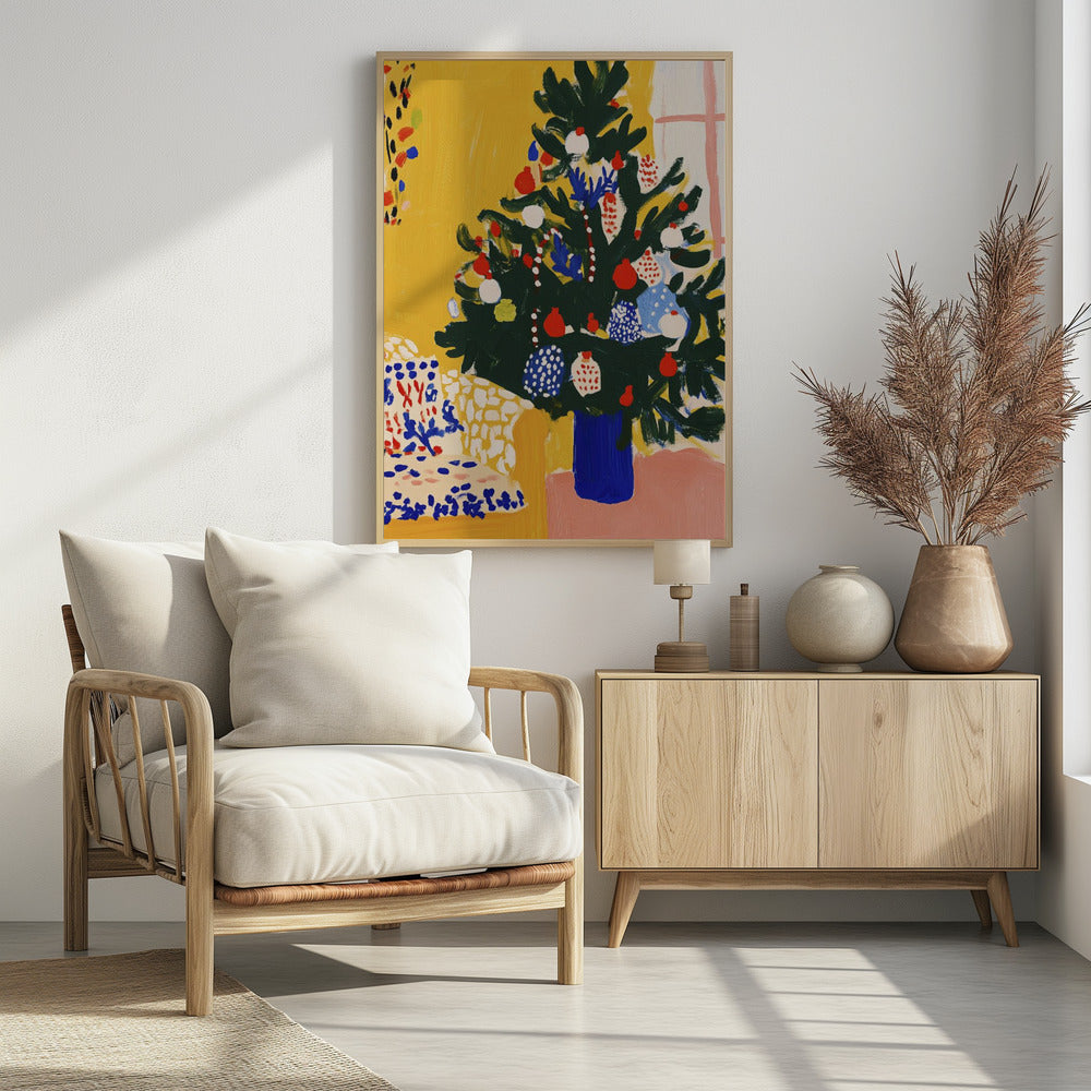 A vibrant, modern painting of a decorated Christmas tree in an expressive, painterly style. The dark green tree, adorned with red, white, and blue ornaments, stands in a cobalt blue vase against a bright yellow wall, with a patterned chair in the foreground. Artwork