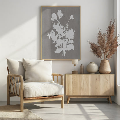 A minimalist piece of framed wall art featuring a stark white silhouette of a bouquet of flowers against a textured, solid gray background, enclosed in a thin black frame. Print