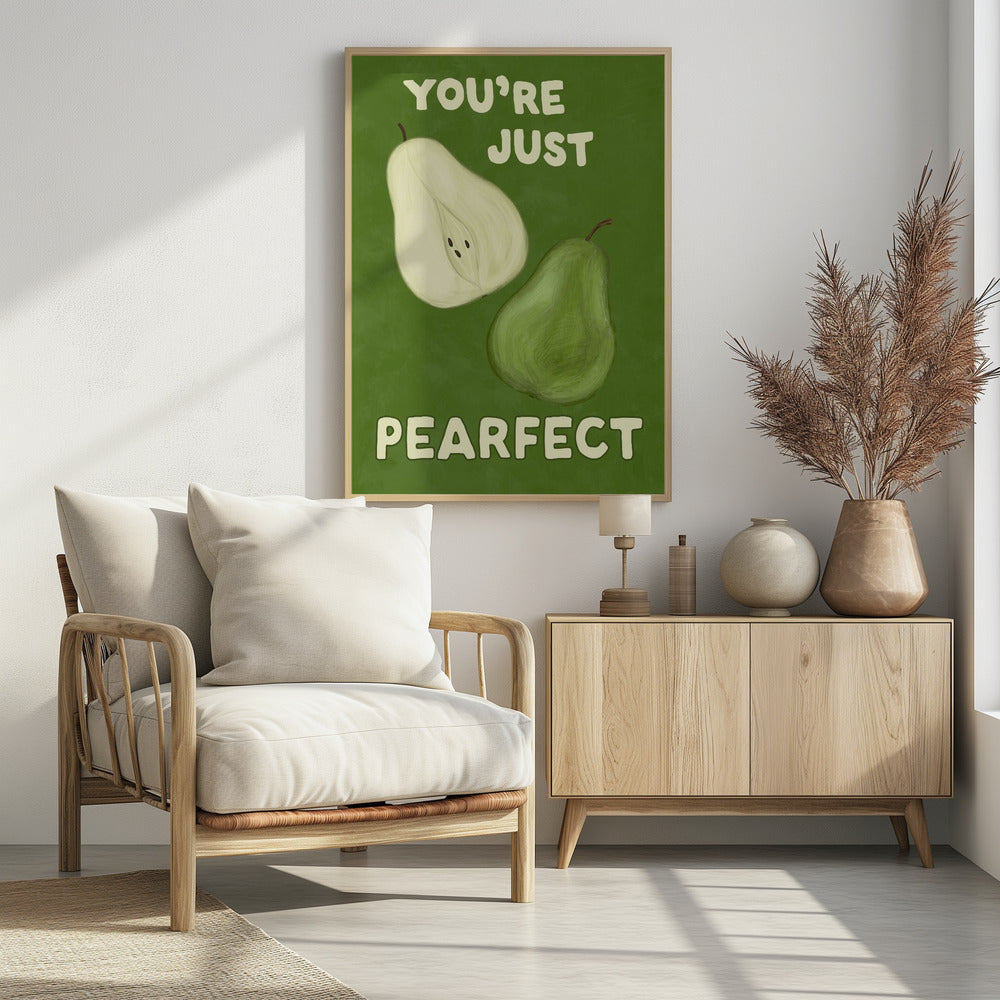 An illustrative poster with a green background featuring a whole pear and a half-pear. The text above reads 'YOU'RE JUST' and below reads 'PEARFECT', creating a pun on 'you're just perfect'. Wall Art