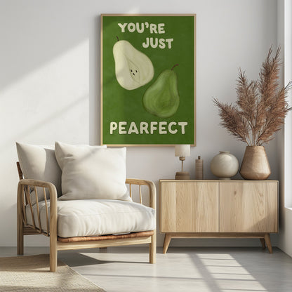 An illustrative poster with a green background featuring a whole pear and a half-pear. The text above reads 'YOU'RE JUST' and below reads 'PEARFECT', creating a pun on 'you're just perfect'. Wall Art