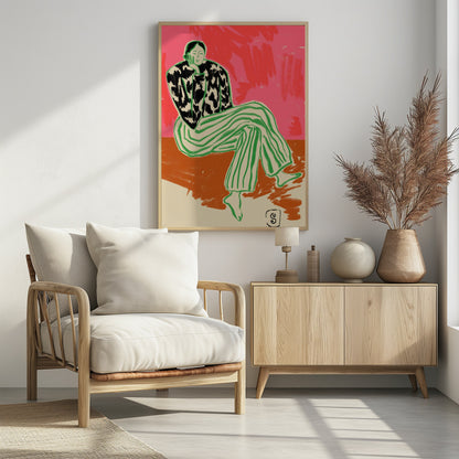 A colorful, stylized illustration of a person sitting in a relaxed, thoughtful pose with their head resting on their hand. They are wearing a black and white cow-patterned shirt and loose green-and-white striped pants. The background is a vibrant abstract blend of pink and red. Artwork