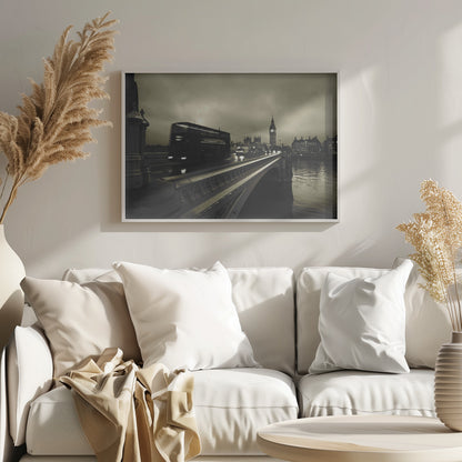 A framed, sepia-toned long-exposure photograph of London. A double-decker bus is shown in motion blur as it crosses Westminster Bridge. In the background, the Big Ben clock tower and the Houses of Parliament are visible against a cloudy sky, with lights reflecting on the wet road and the River Thames. Wall Art